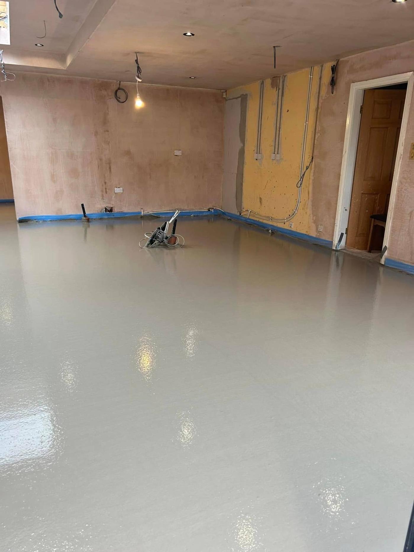 Liquid screed pumped into a renovation